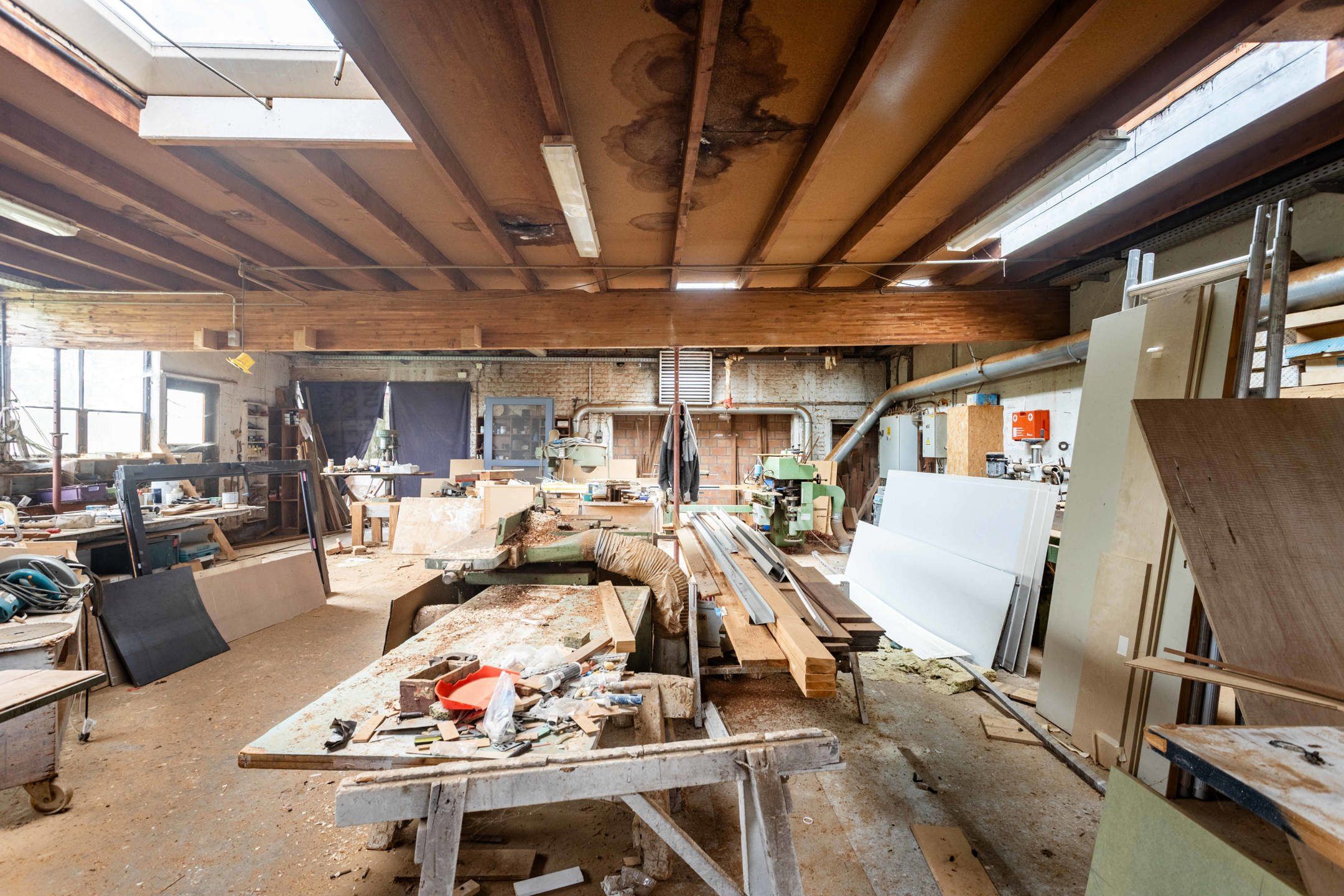 Atelier/loods met bouwgrond en parking in Nederename foto 5