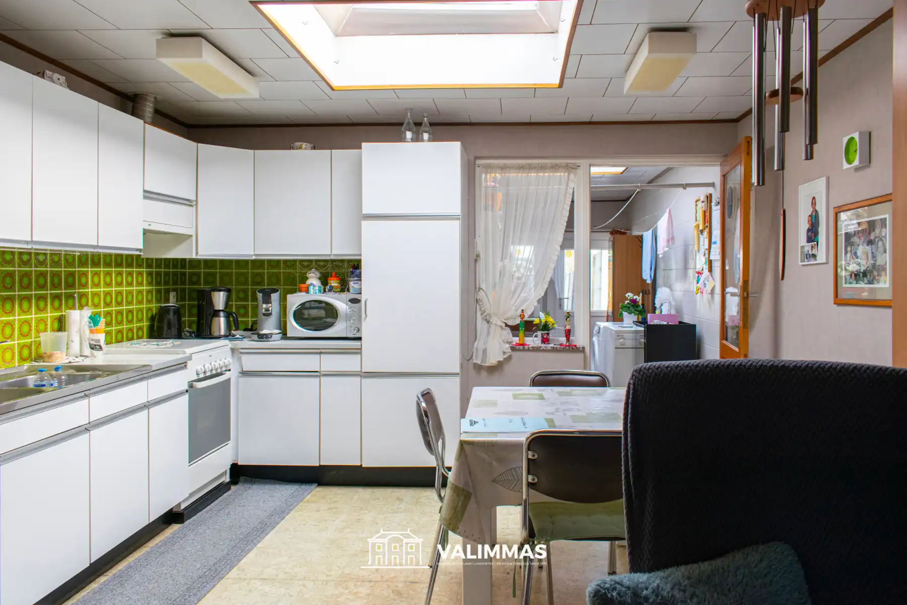 Goed onderhouden rijwoning met terras, tuinhuis en garage... foto 9