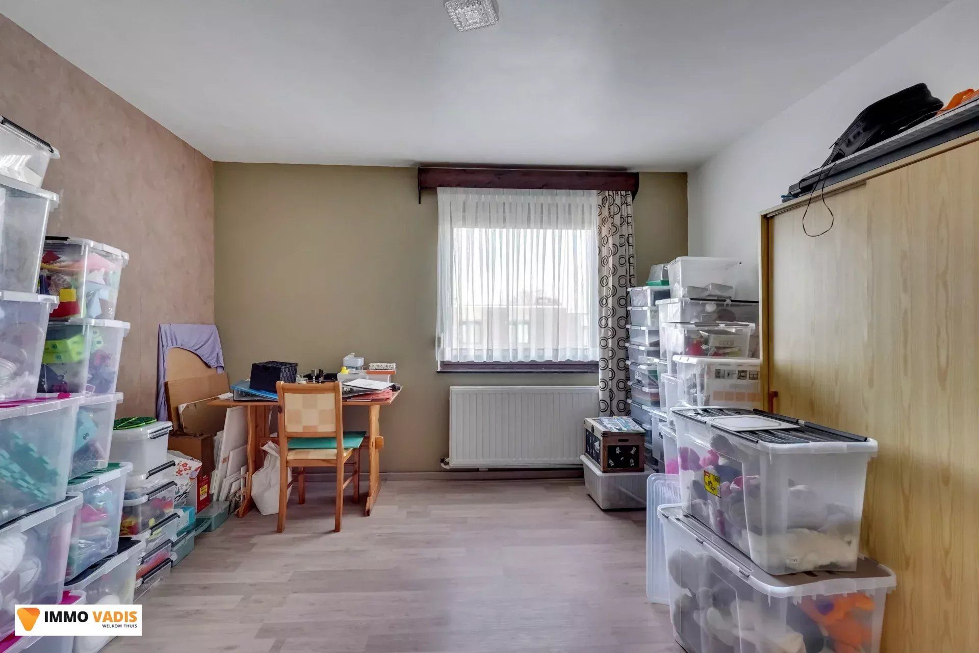 Ruime gezinswoning met drie slaapkamers en inpandige garage foto 11