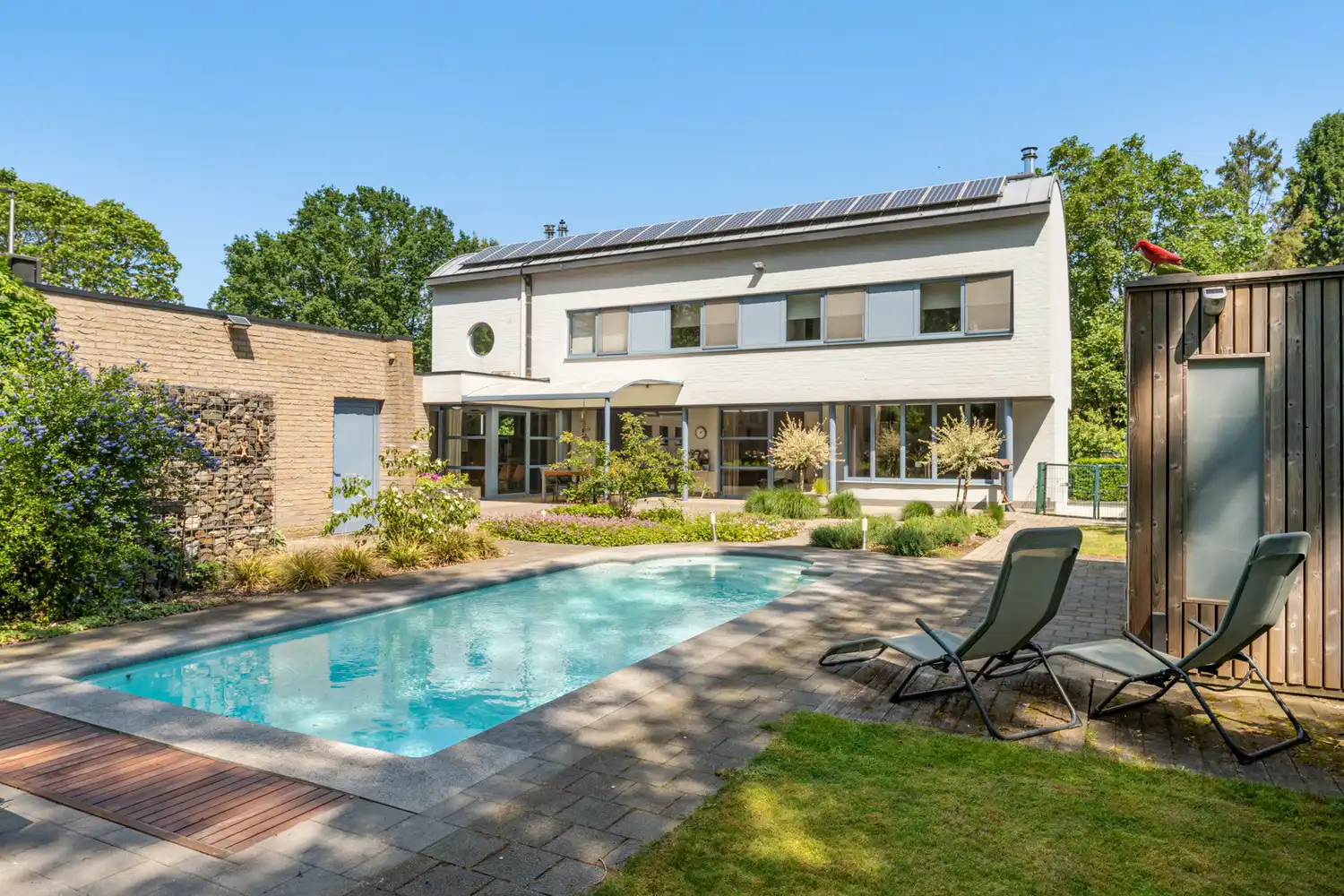 Moderne villa  met zwembad op toplocatie in Genk - instapklaar en future-proof foto {{pictureIndex}}