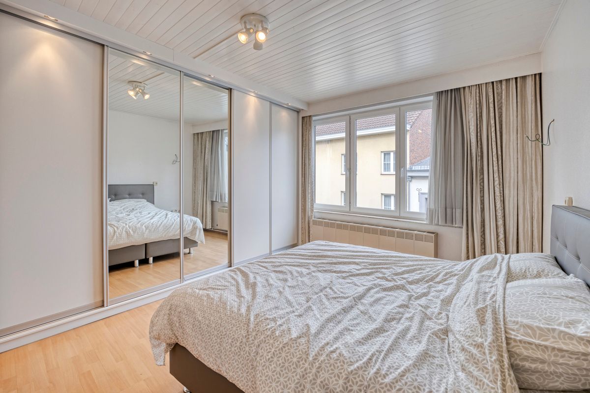 Karaktervolle stadswoning met handelsruimte, tuin en ruime garage in hartje Tongeren foto 11