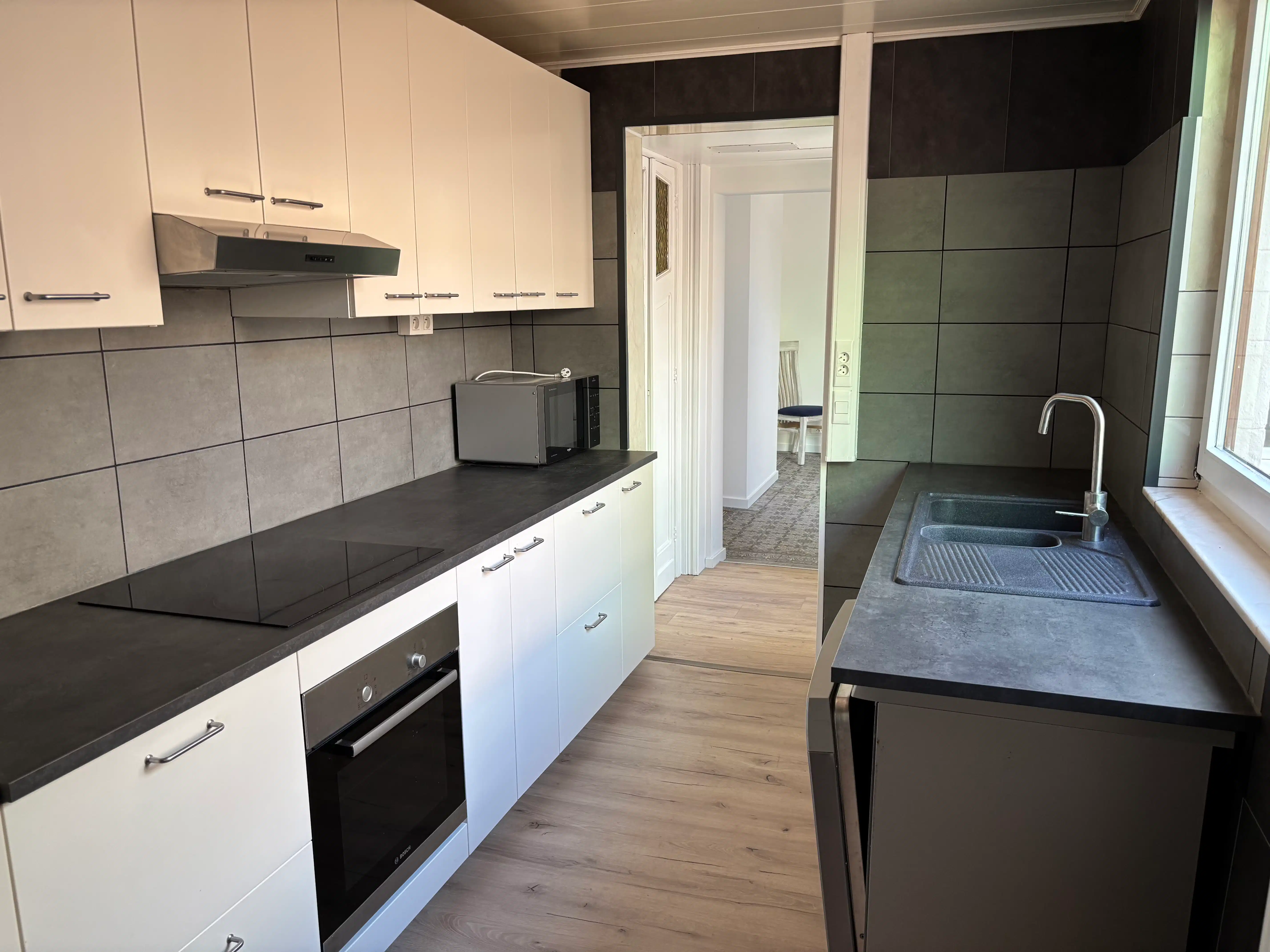 Gezellige rijwoning 4 slaapkamers + garage en stadstuin foto 7