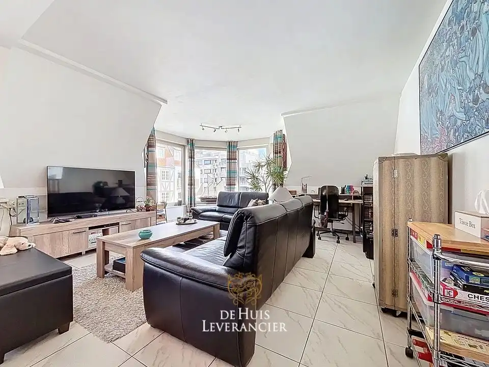 Uw eigen plek aan zee: stijlvol duplex-appartement met 3 slpks in het hart van Koksijde foto 12