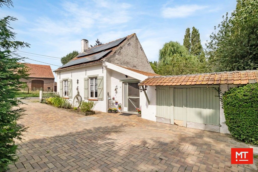 CHARMANTE WONING MET EEN PRACHTIGE TUIN OP EEN LANDELIJKE LOCATIE TE BESELARE foto 10