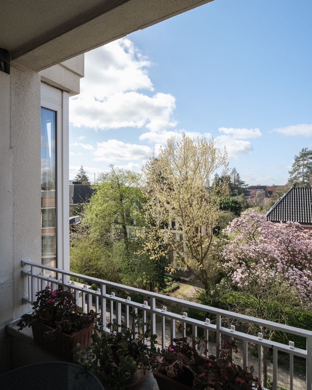 Lichtrijk appartement met 2 volwaardige slaapkamers, inpandig terras en gemeenschappelijke tuin, in een residentiële straat nabij het station Gent-Sint-Pieters. foto 6