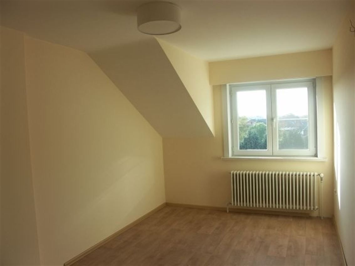Opbrengsteigendom (handel & 4 app) op toplocatie foto 31
