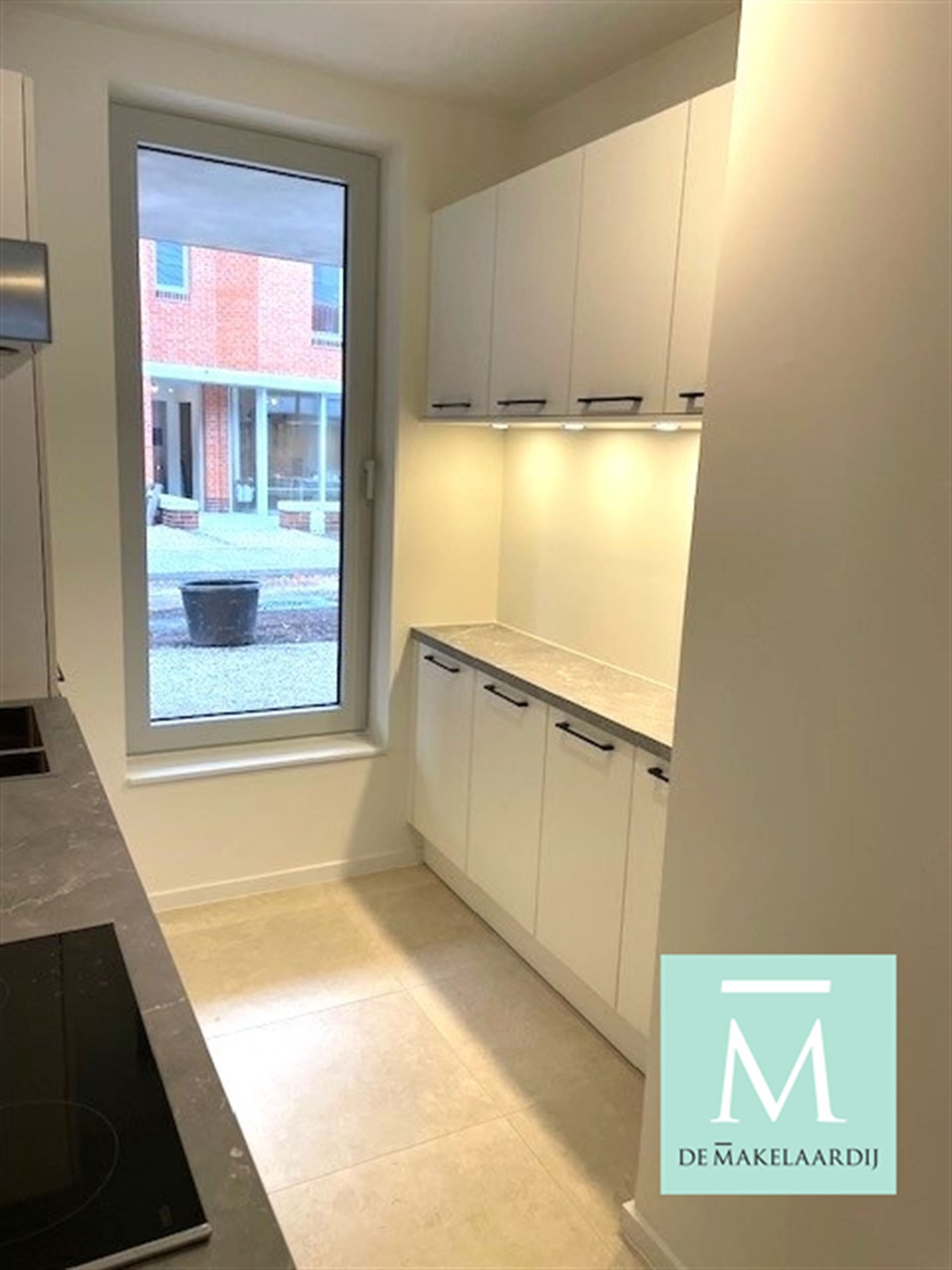 Gelijkvloers nieuwbouwappartement met 2 slaapkamers, terras/tuin op toplocatie! foto 3