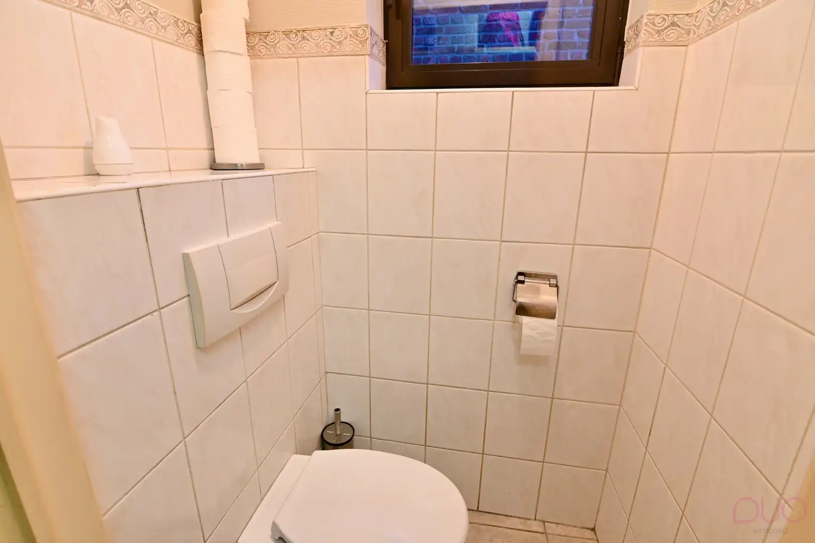 Instapklare woning in hartje Sint-Truiden met gezellige stadstuin en garage foto 21