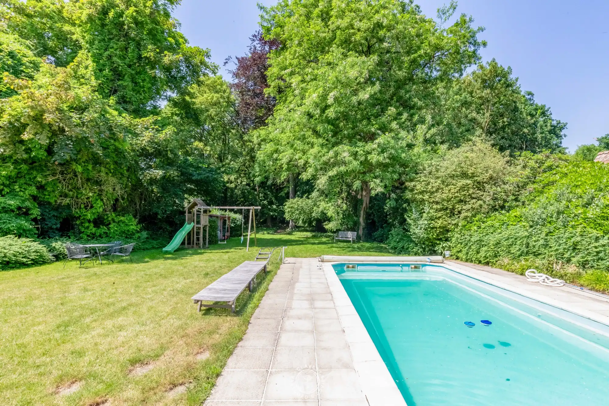 Welgelegen villa met praktijk en wonderlijke tuin foto 23