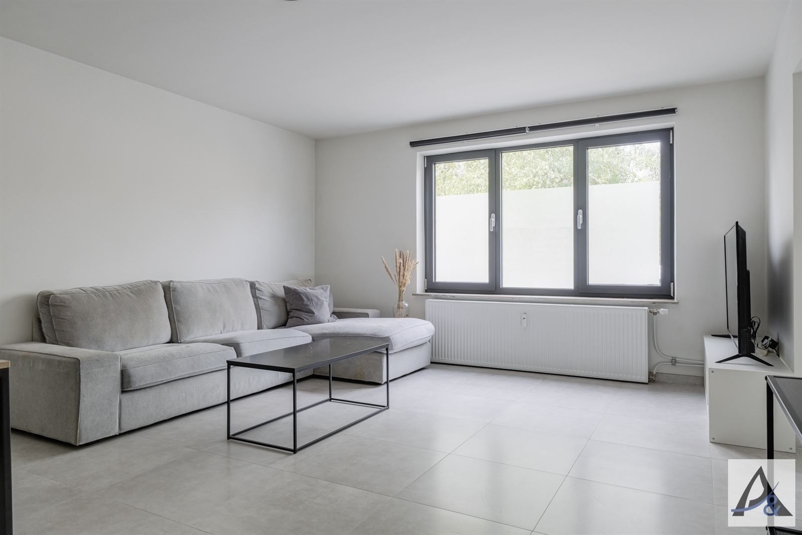 Instapklaar gelijkvloers appartement in hartje Bilzen met garage foto 5