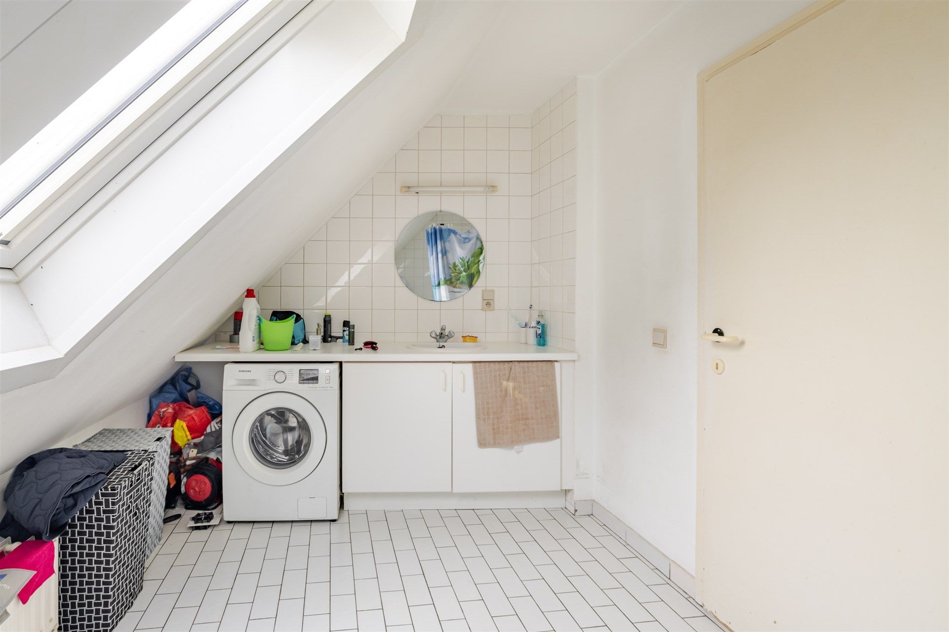 Opbrengsteigendom bestaande uit 4 appartementen + 22 garageboxen + magazijn/werkplaats foto 12