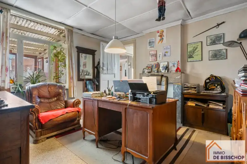 Te renoveren half open bebouwing met 3 slaapkamers, tuin en garage. foto 5