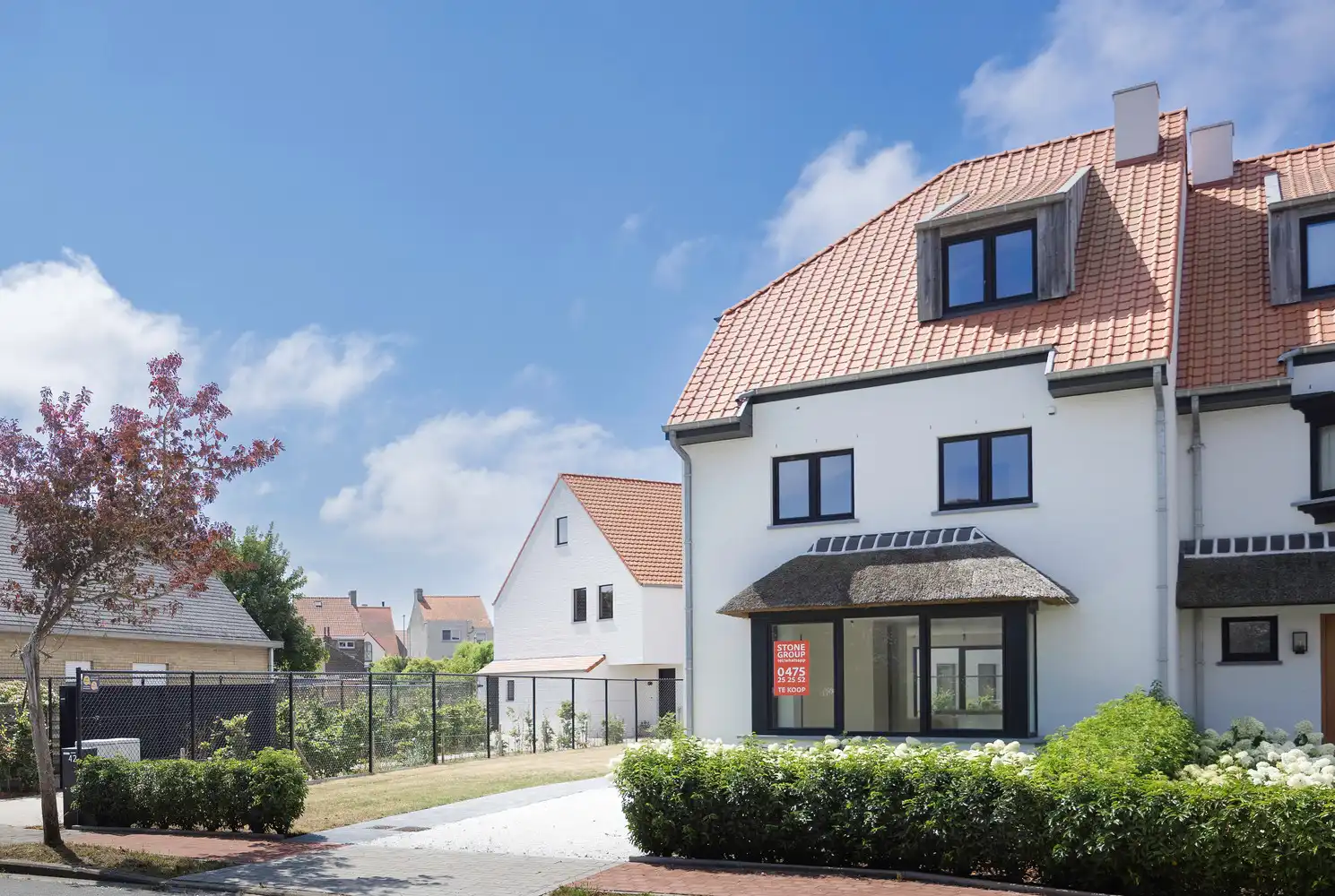 Nieuwbouw koppelvilla in een rustige wijk op wandelafstand van het strand in Duinbergen: foto {{pictureIndex}}