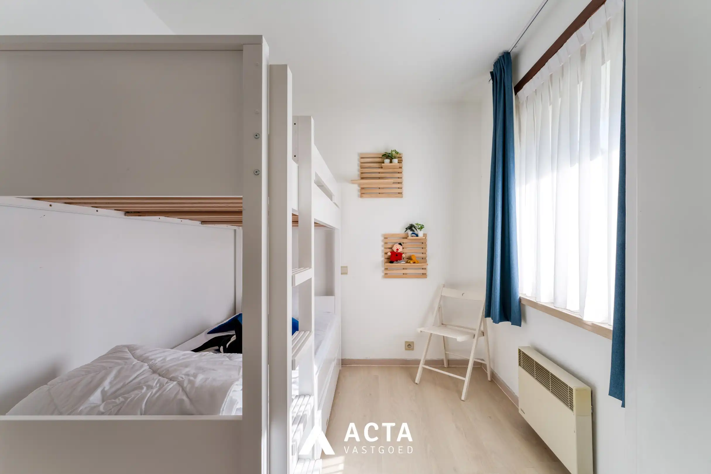 Gelijkvloers 3-slpk-appartement+tuin in Mariakerke foto 11