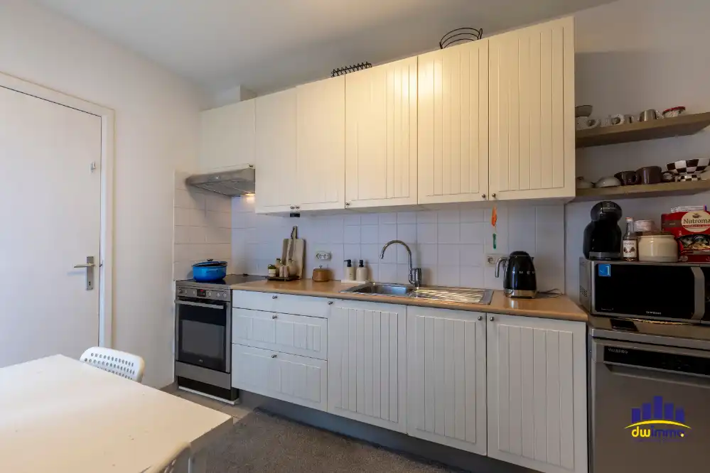 Ruime halfopen bebouwing met grote tuin in Lochristi opp. 688m² foto 7