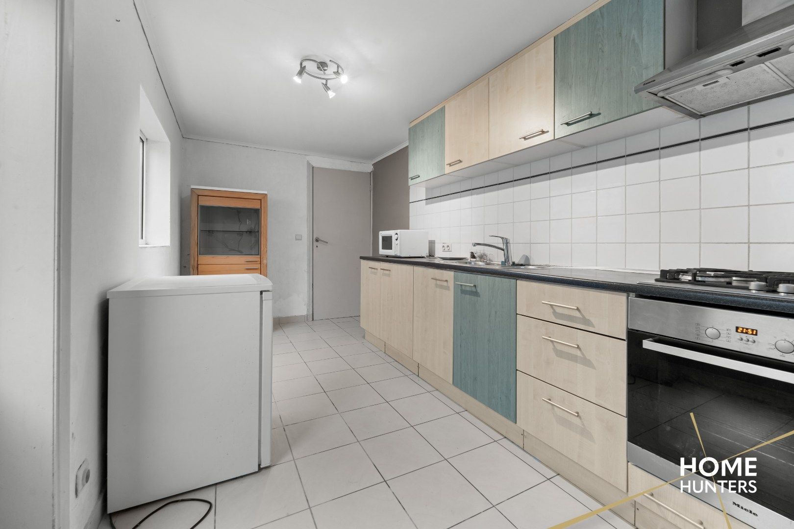 Charmante, op te frissen rijwoning met ruime tuin en 3 slaapkamers foto 9