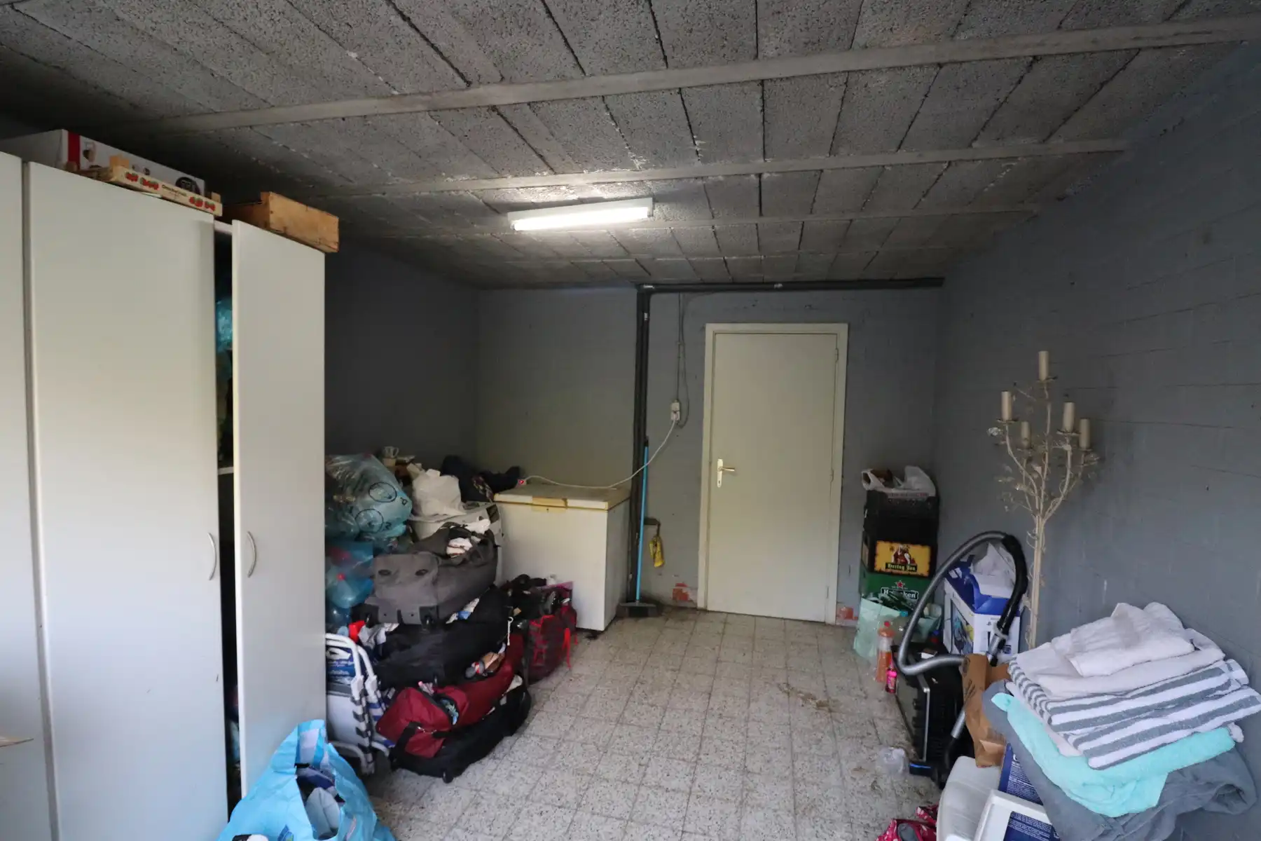 Appartement op de tweede verdieping met 2 slaapkamers met op het gelijkvloers garage met berging en tuin. foto 11