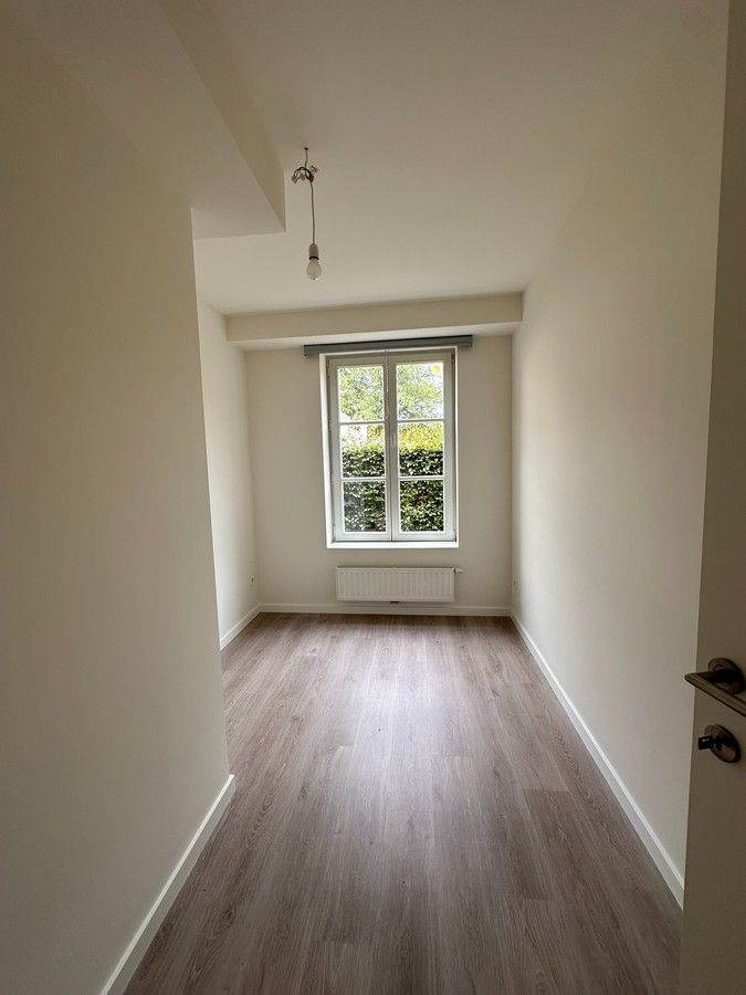 Mooi gelijkvloersappartement met 2 slpk en parking foto 16