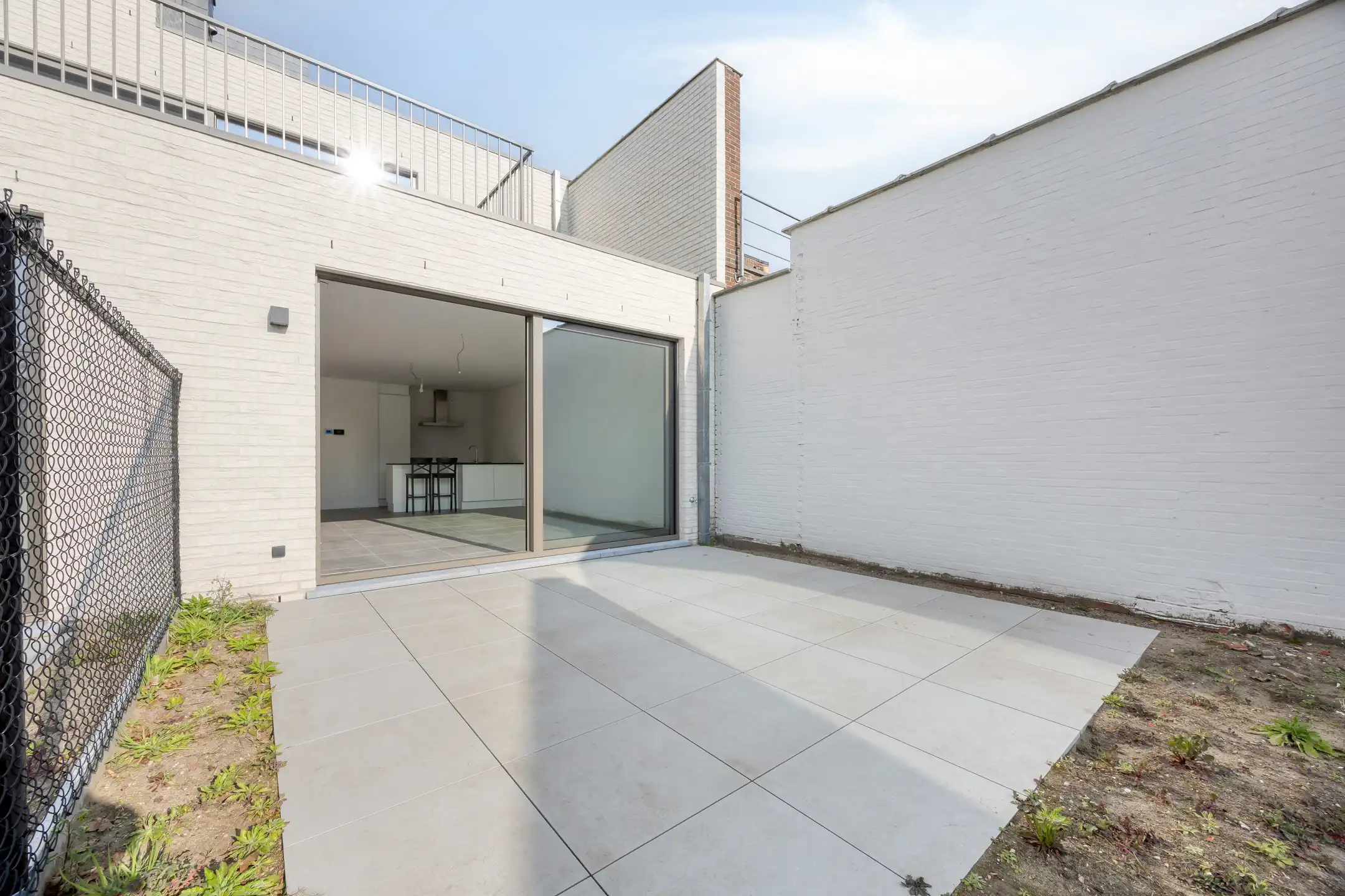 Stijlvol gelijkvloers appartement met tuin foto 20