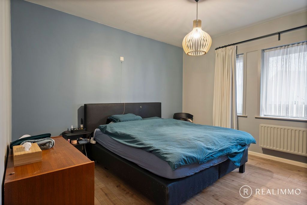 Ruime, lichtrijke woonst met 3 slaapkamers en garage foto 8