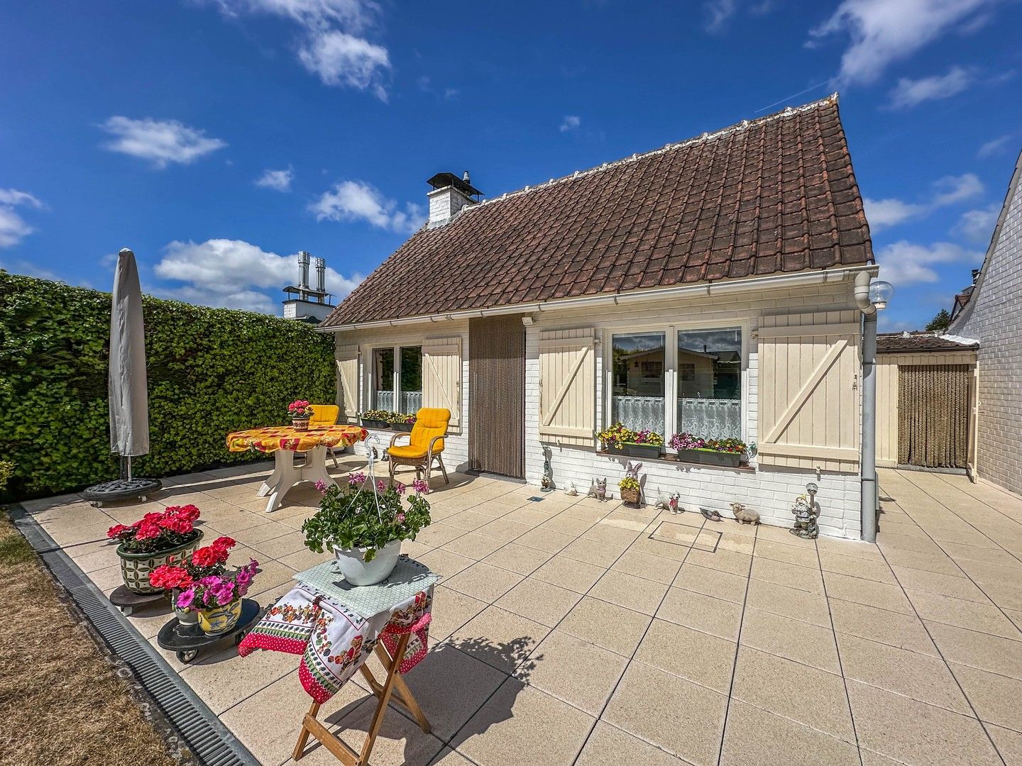 Verzorgde vakantiewoning met zonnige tuin in domein Sunparks. foto {{pictureIndex}}