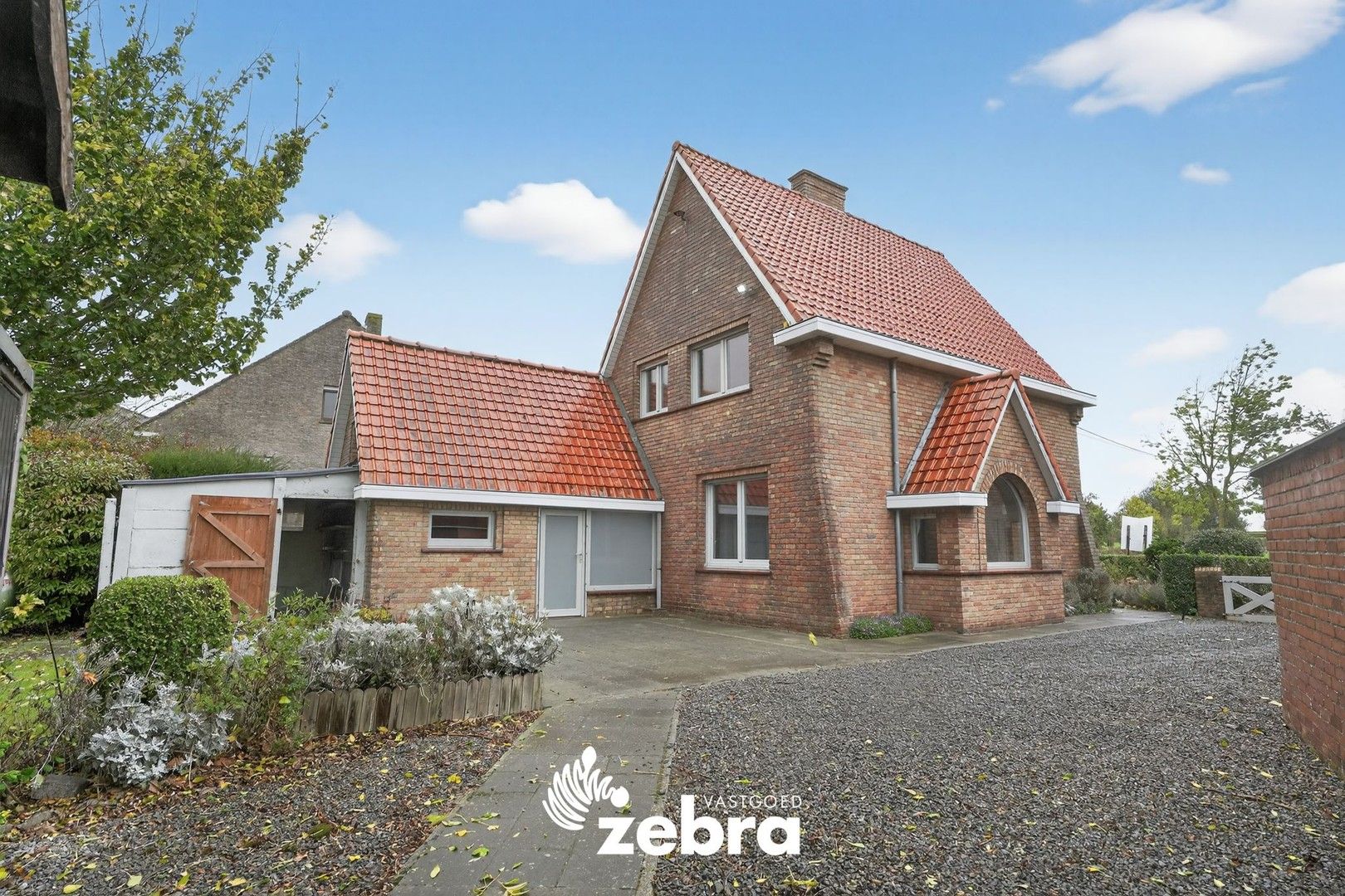 Charmante alleenstaande woning met ruime tuin in Beveren-aan-de-IJzer! foto 2