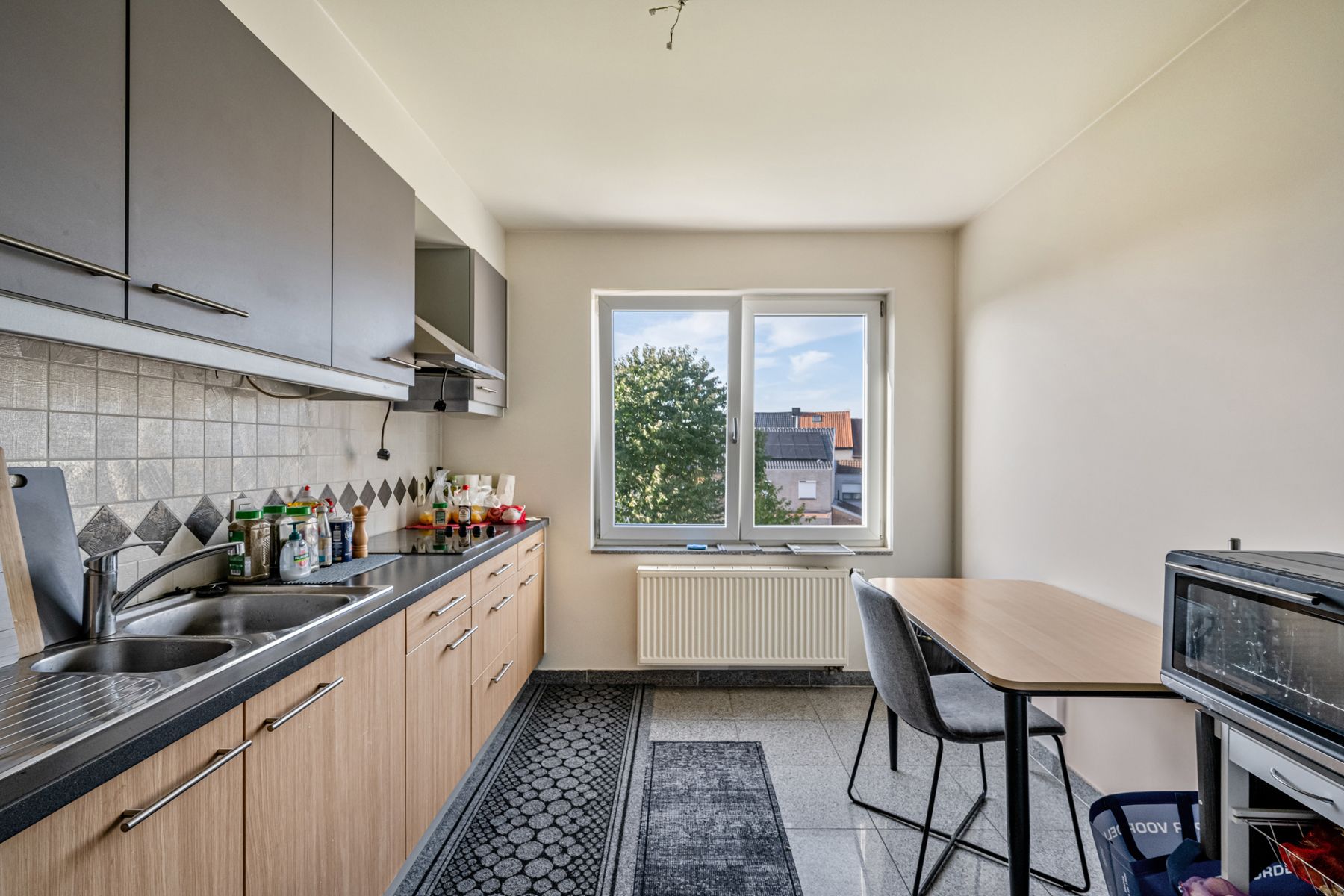 Duplex appartement met 2 SLPK, garage en berging foto 4