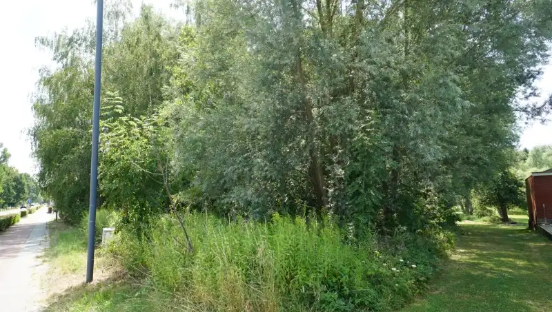 Bouwgrond 8 are 80 ca open bebouwing vlakbij centrum met mooi achterzicht op groene omgeving foto 7