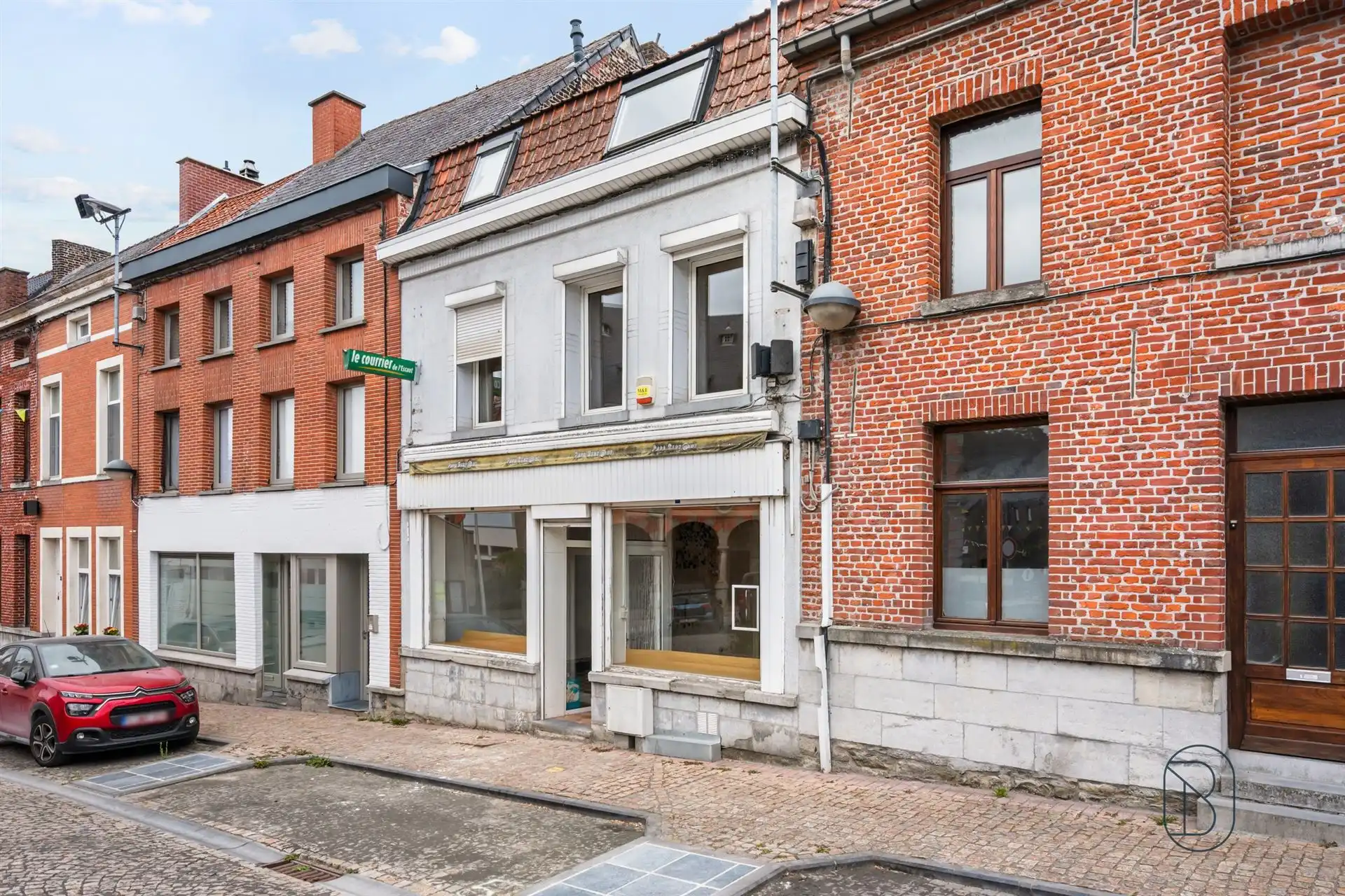 Handelspand met woonst en in centrum Antoing foto 14