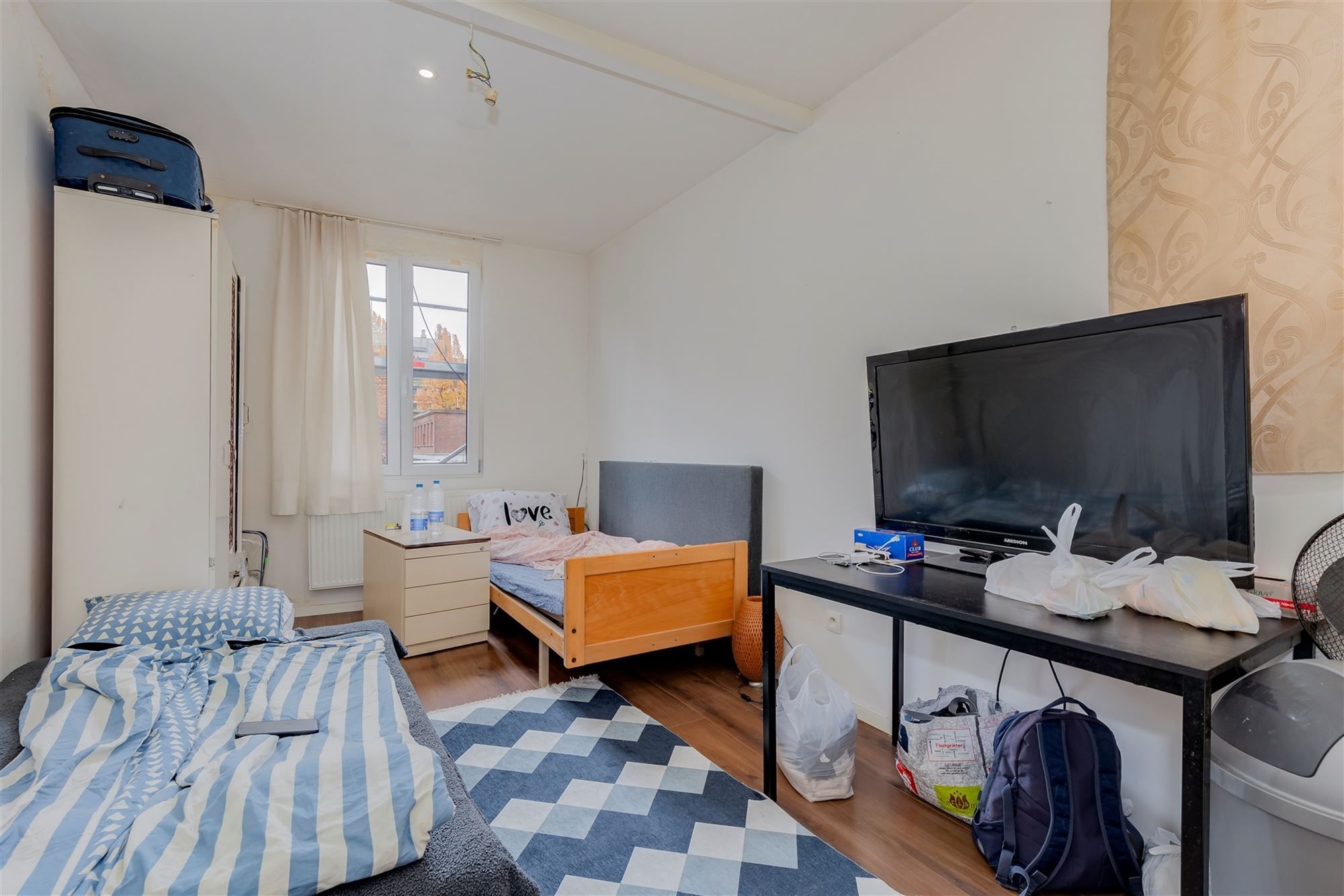 Huis ingedeeld in 6 verhuurde units - 8,8% netto rendement foto 24