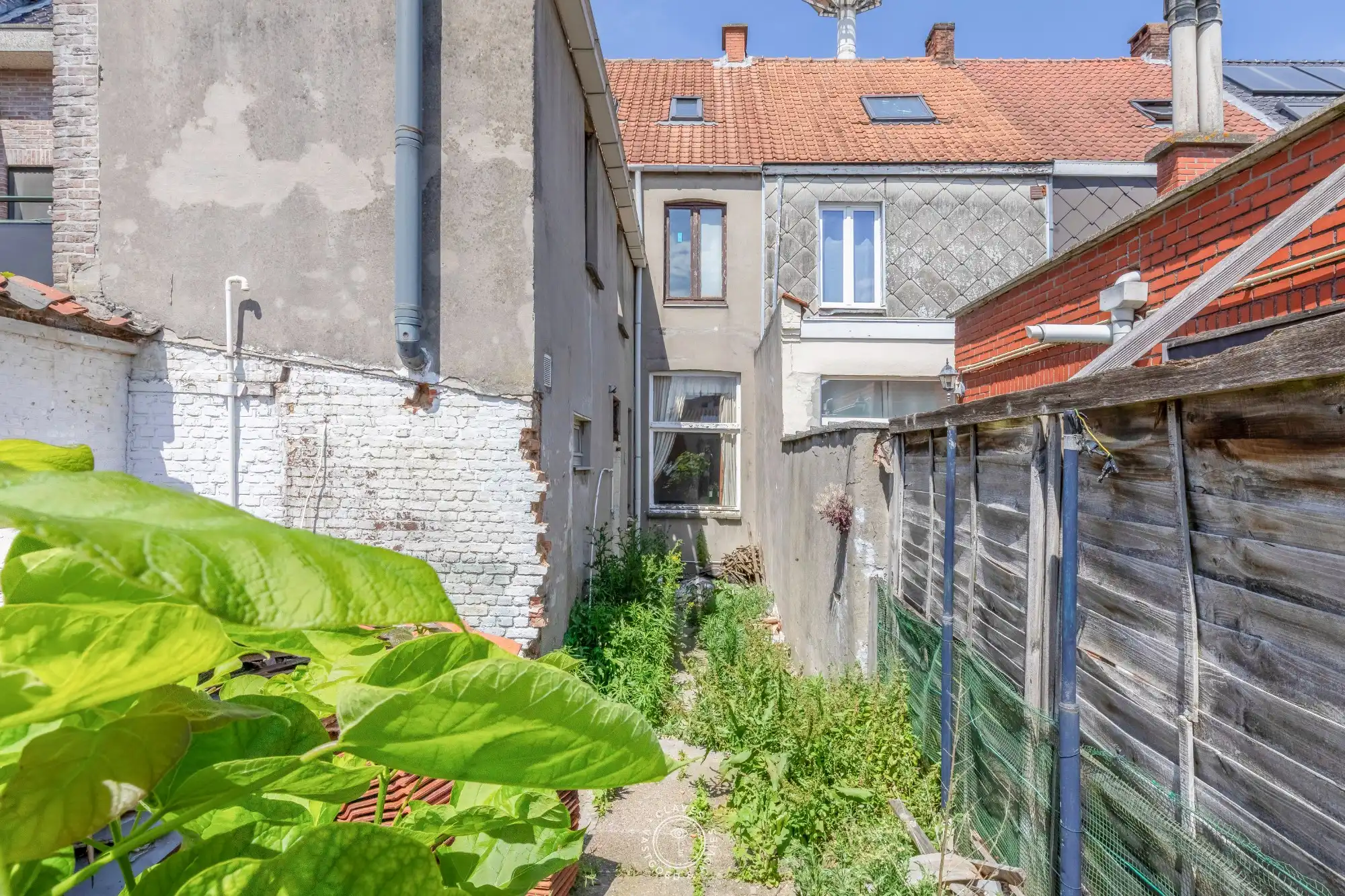 Te renoveren woning met garage in het centrum van Sint-Niklaas foto 6