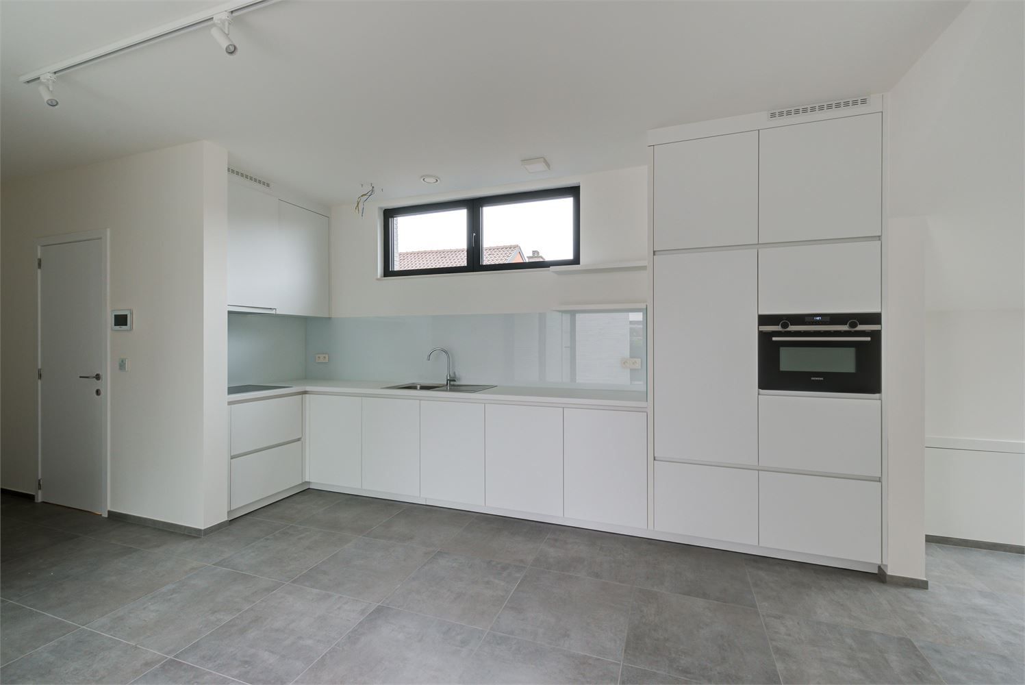 RECENT APPARTEMENT (116M²) MET TERRAS GELEGEN IN HET CENTRUM VAN BILZEN foto 2