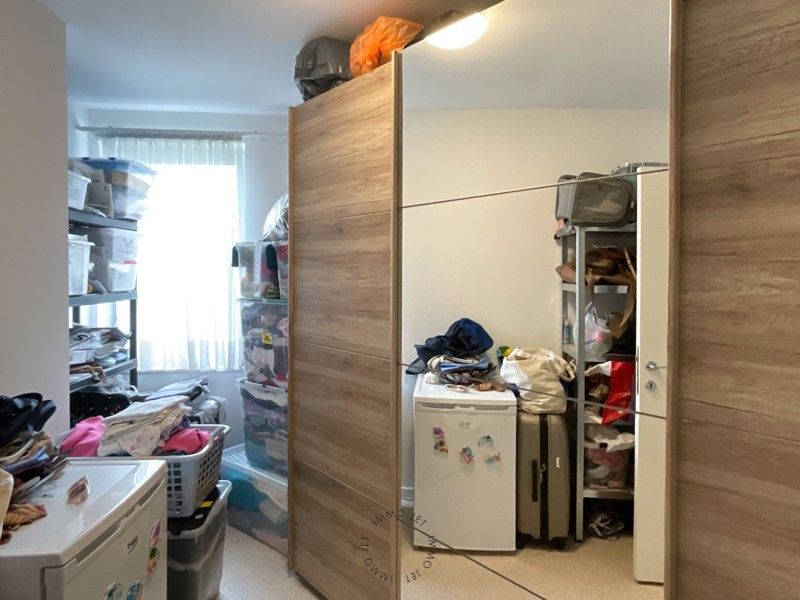 Mooi appartement aan het kerkplein van Melsele met twee slaapkamers en terras foto 7