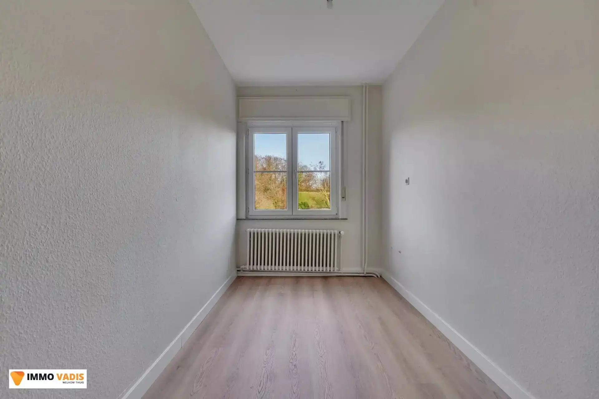 Karaktervolle herenwoning met vier slaapkamers, inpandige garage en tuin foto 12