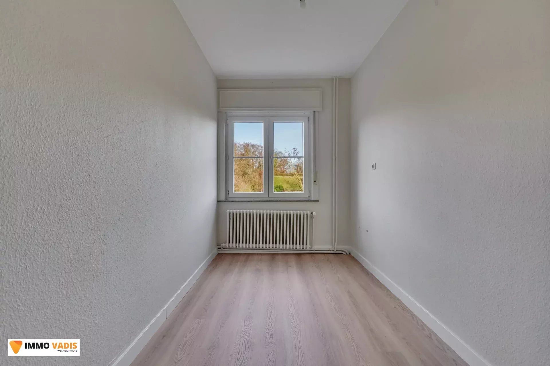 Karaktervolle herenwoning met vier slaapkamers, inpandige garage en tuin foto 12