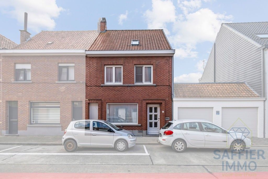 Ruime woning met tuin en uitweg in het hart van Ingelmunster foto 2