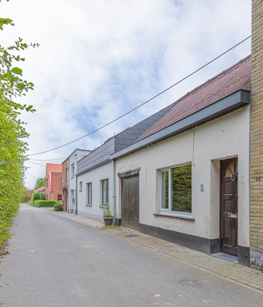 Te renoveren woning, gelegen in een rustige straat te Meise. foto 16