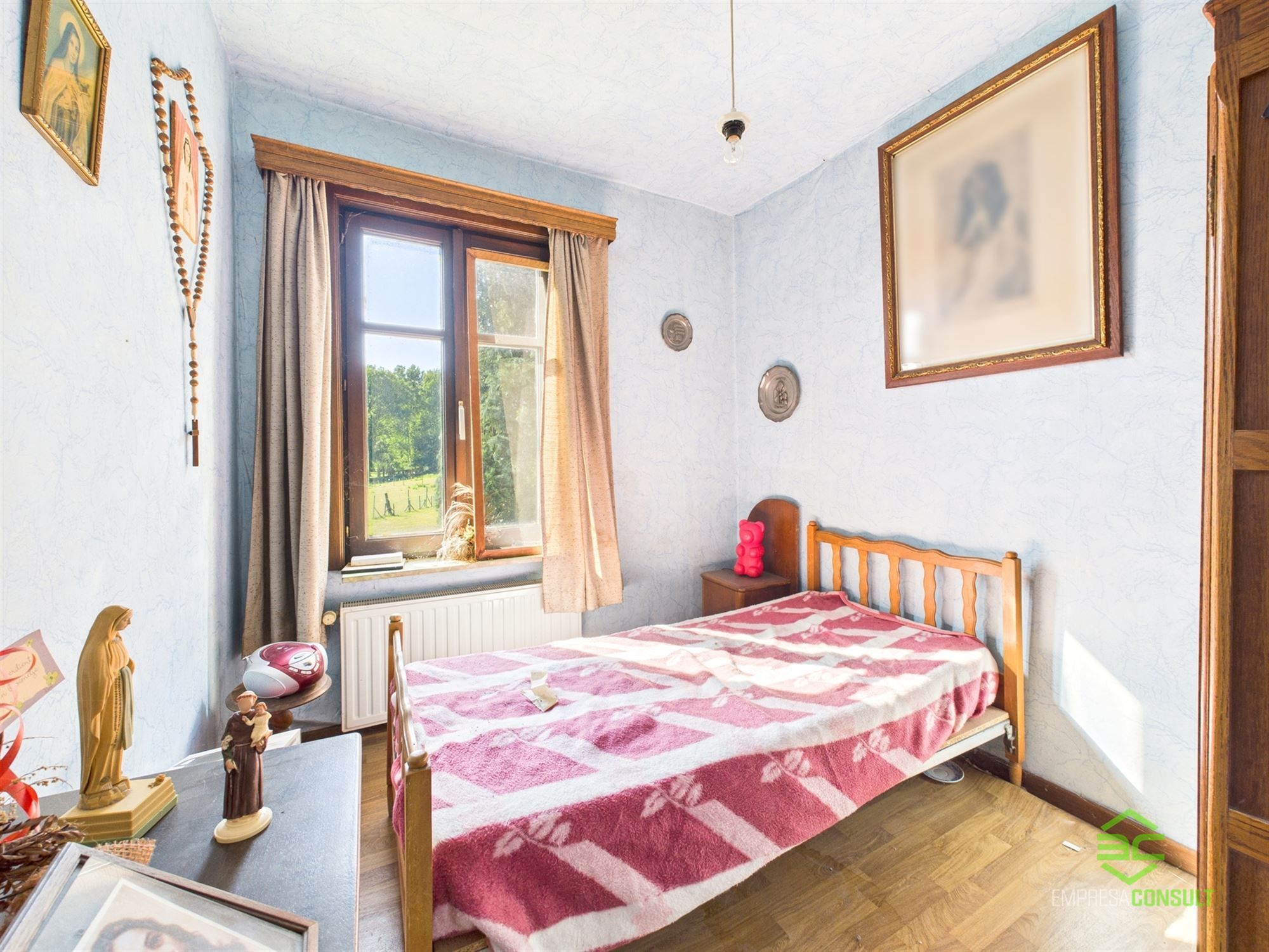 Op te frissen gezinswoning met 3slpk in Montenaken! foto 9