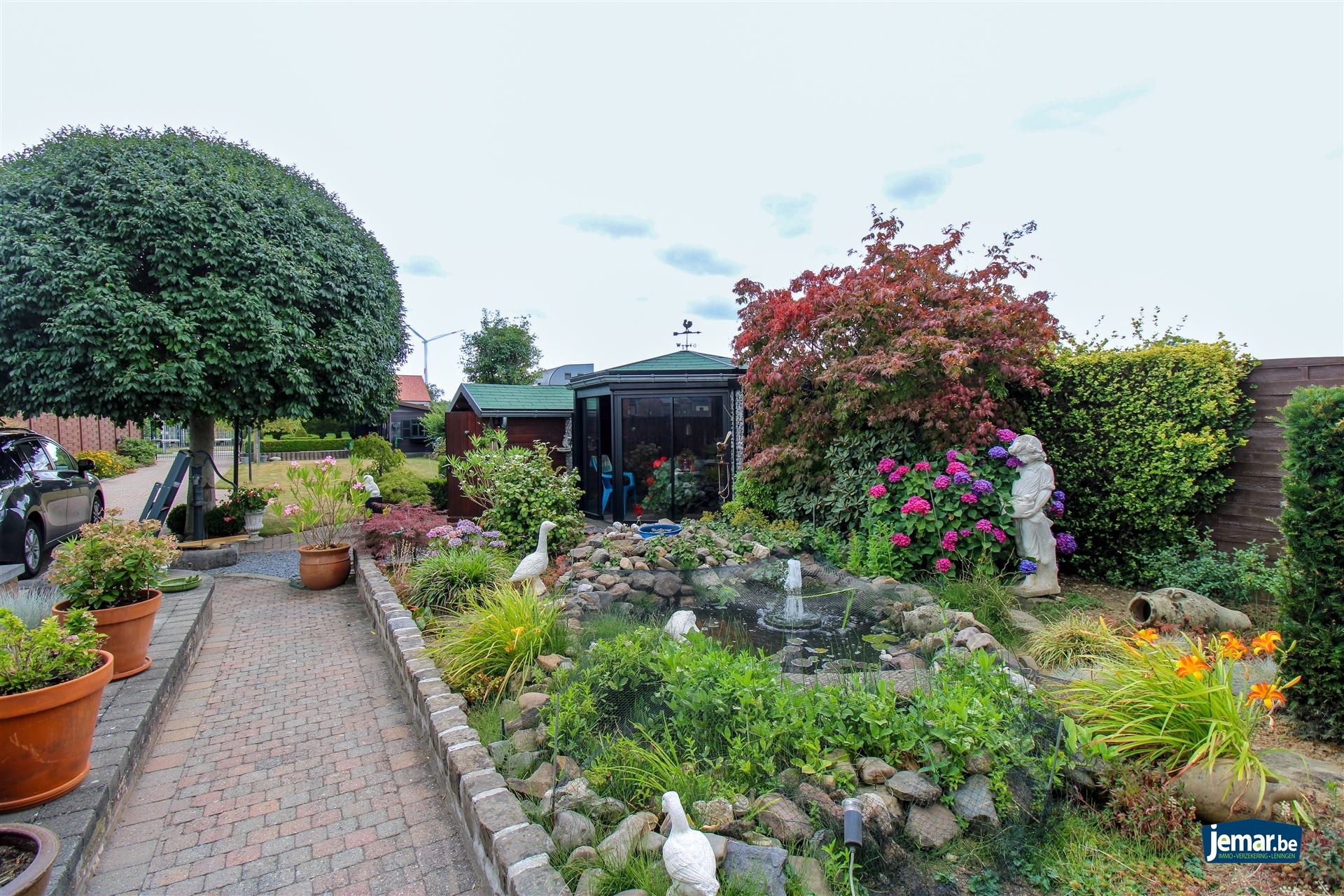 Instapklare en perfect onderhouden woning met 3 slaapkamers, 2 badkamers en een prachtige tuin van 6a74ca  in hartje Maasmechelen! foto 18