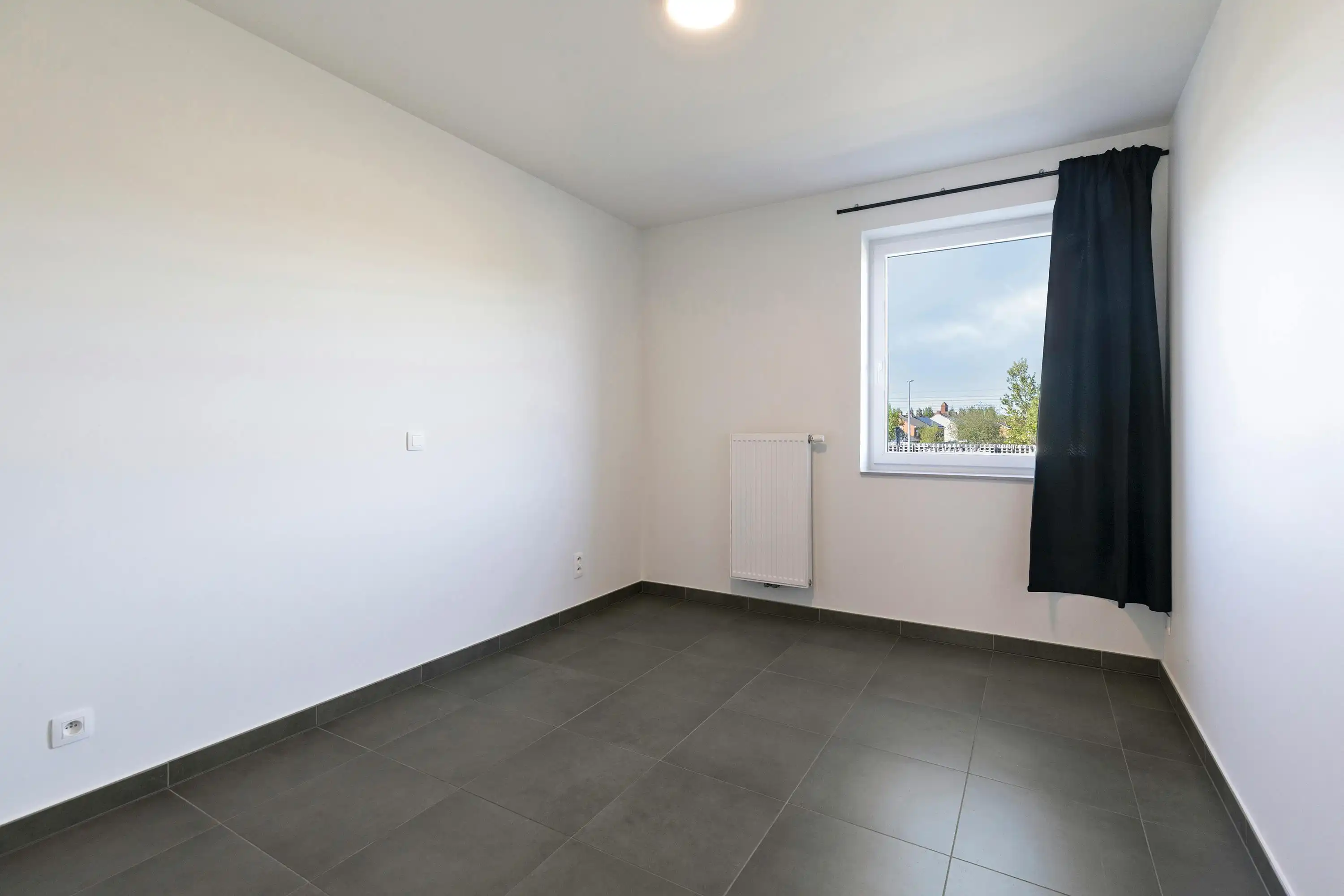 Appartement met 2 slaapkamers en staanplaats te Veurne. foto 7