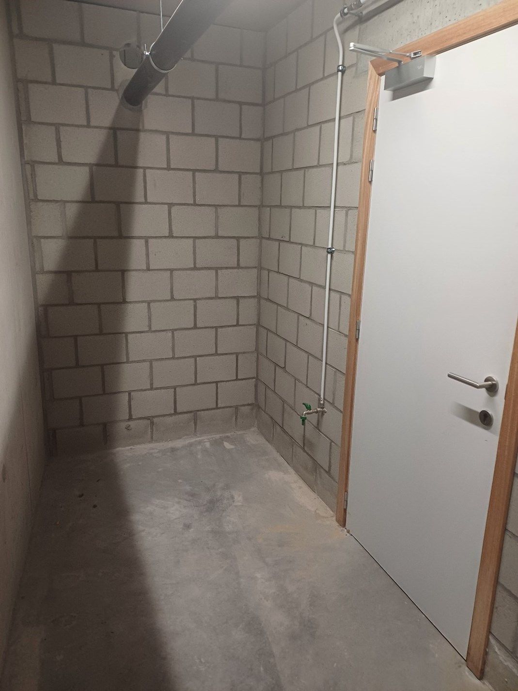 Instapklaar gelijkvloers appartement in Peer centrum met ruim terras + tuintje. foto 26