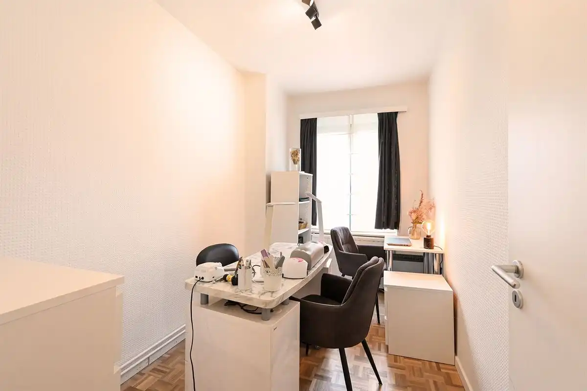 Mooi hoekappartement met garage foto 15