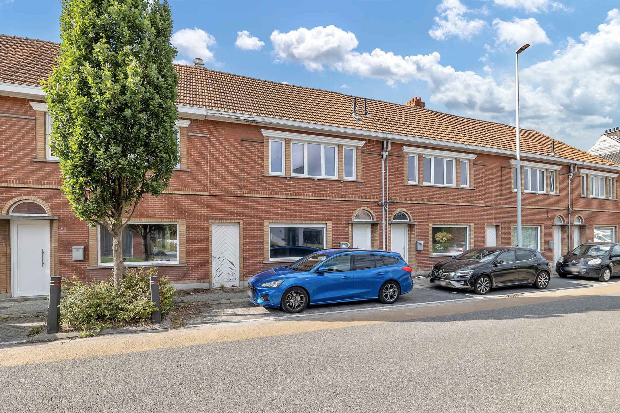 Rustig gelegen, te renoveren rijwoning foto 3