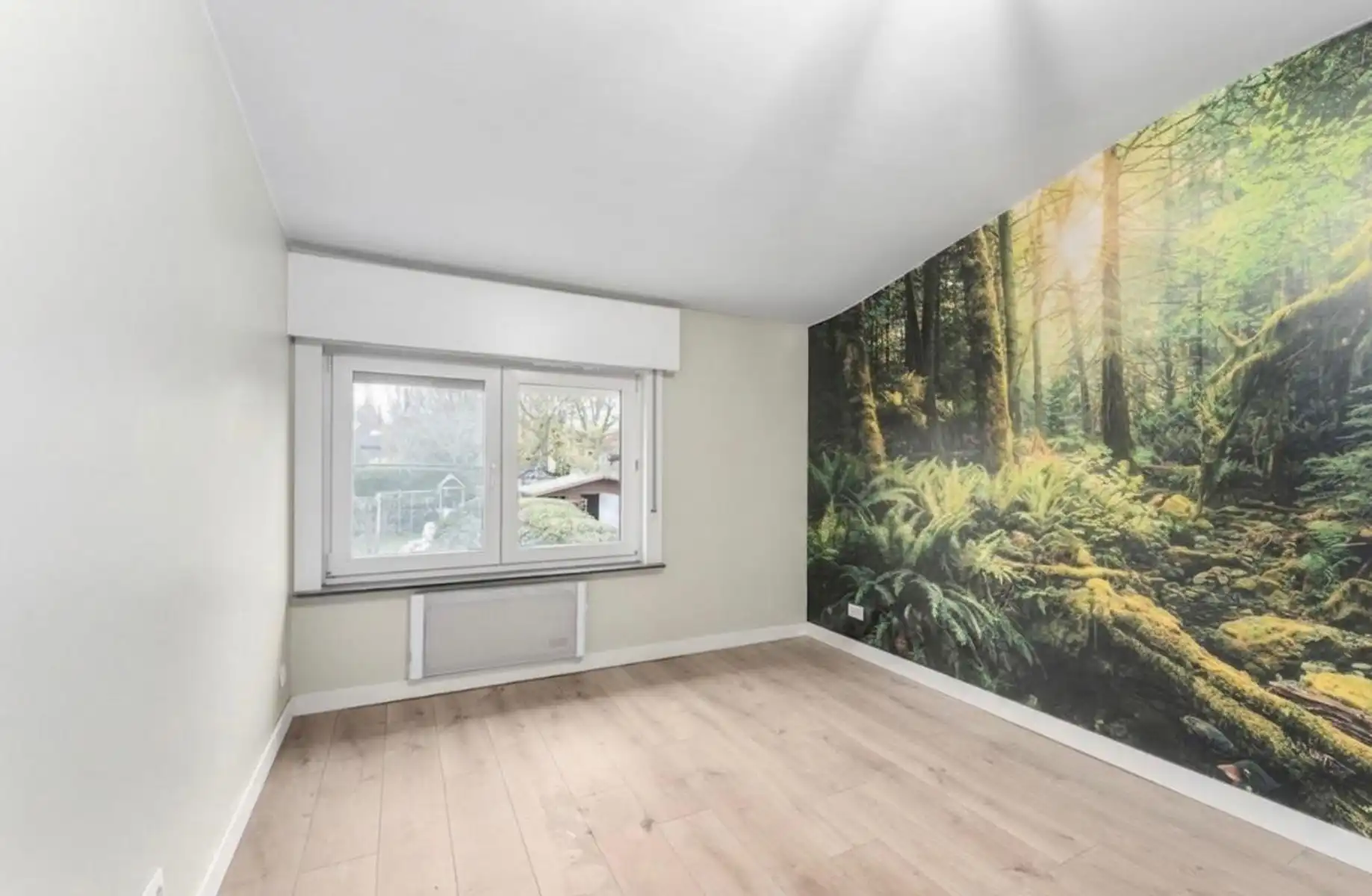 Rustig gelegen woning met garage en tuin foto 16
