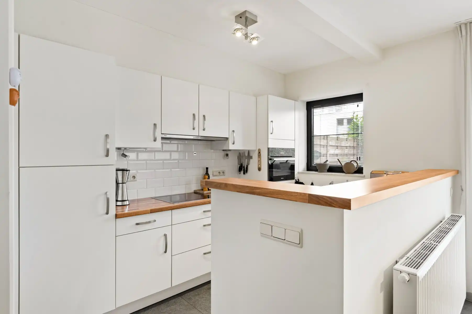 Gelijkvloers appartement met tuin en staanplaats foto 8