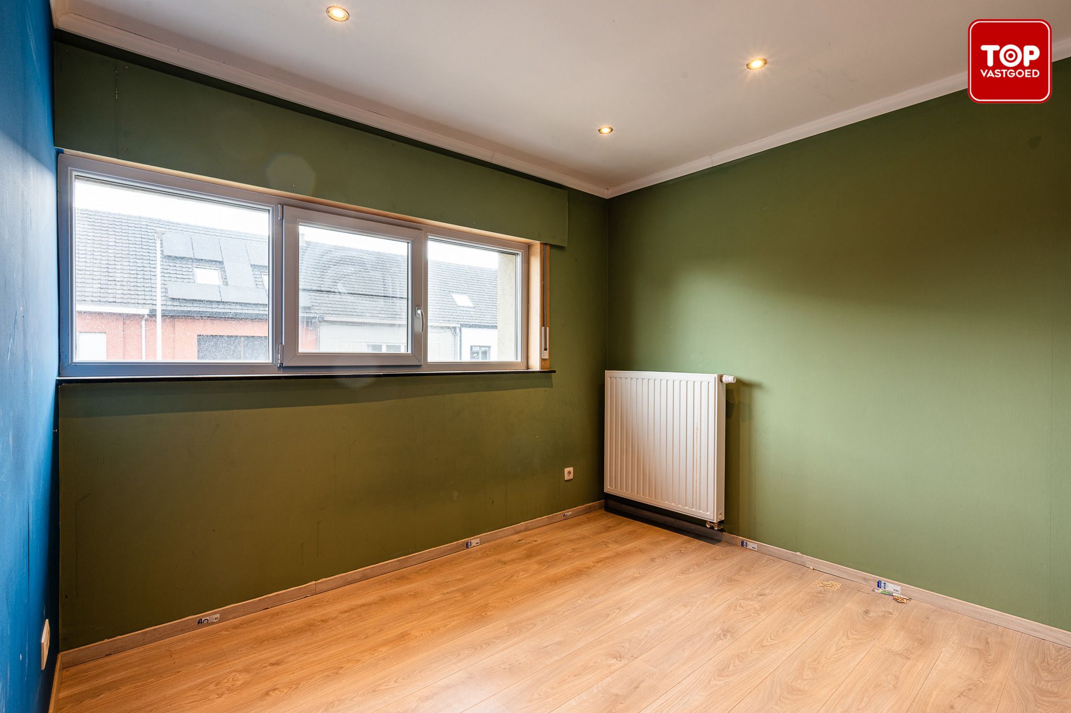 Halfopen woning met 4 slaapkamers, grote tuin en  ruime garage foto 9