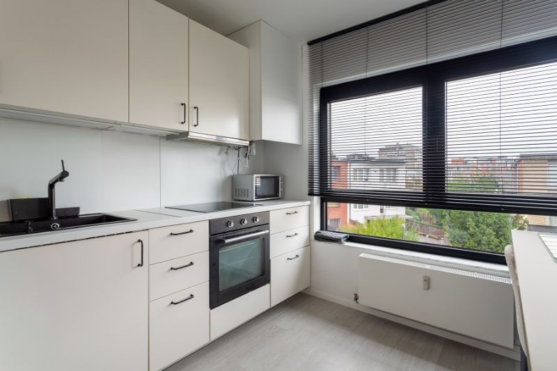 Ruim en lumineus, instapklaar 2 slpk. app. met terras en zicht op het groen+P! foto 10