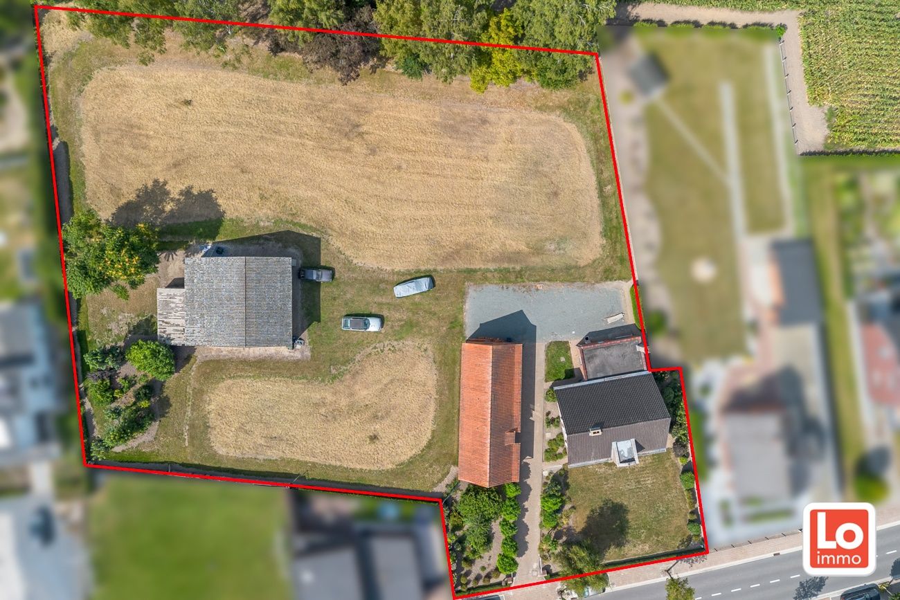 Statige open woning met ruim bijgebouw op groot perceel grond in het centrum van Kalken! foto 3