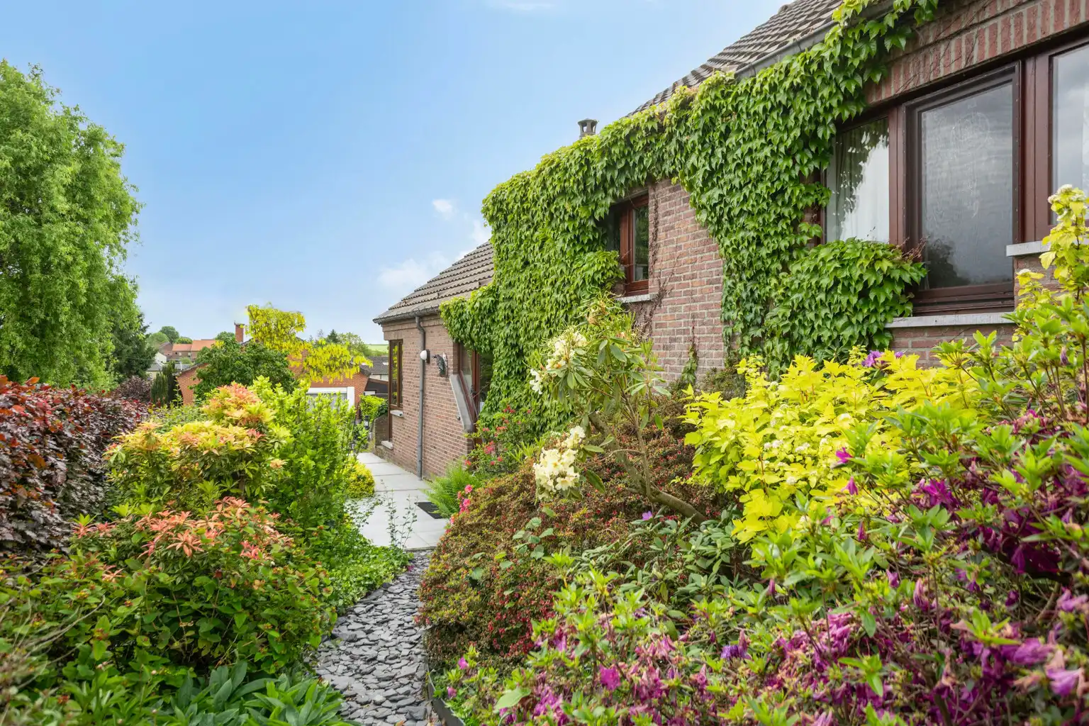 MOOIE WONING MET TUIN IN EEN RUSTIGE WIJK IN NEERVELP.   foto 7