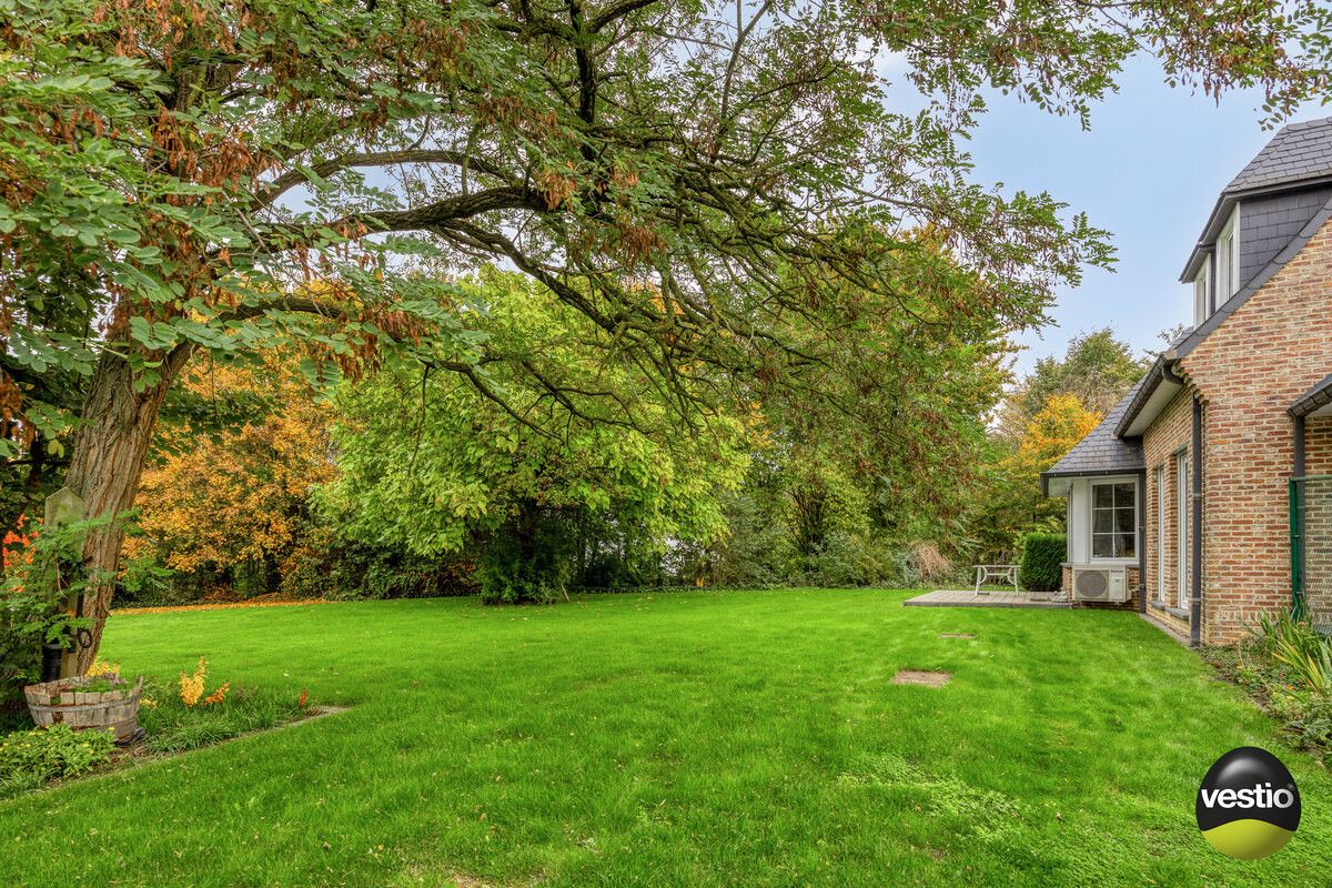 RUSTIG GELEGEN RUIME VILLA MET 5 SLK OP RIANT PERCEEL VAN 18A61CA IN STADSRAND TONGEREN. foto 53